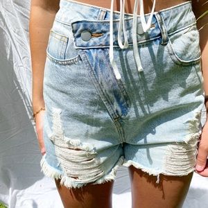 Asymmetrical denim shorts